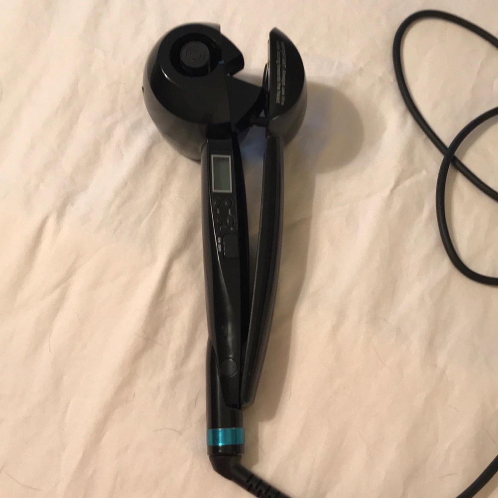 Spin curler like new.  Used twice